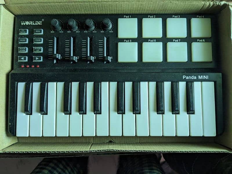 I'm selling my midi keyboard plus mixture 1