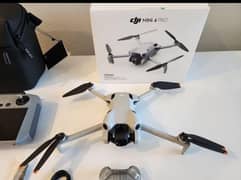 Dji mini 4 pro Rc2 45 minutes new box Open