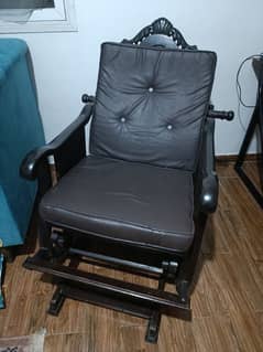 Rocking chair with leg support