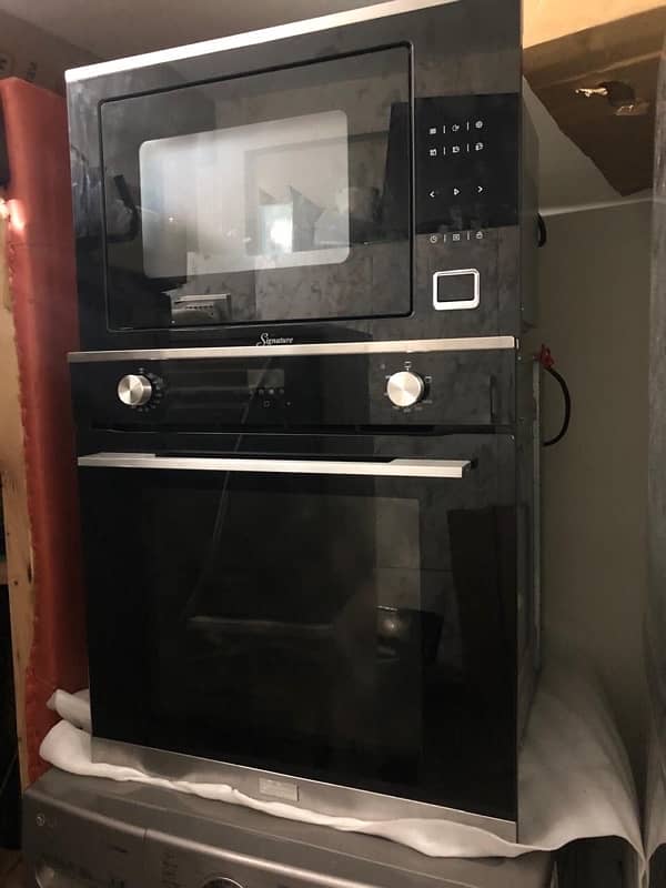 Built in  baking  oven electric +gas imported  used two times 1