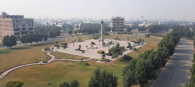 Park Facing one kanal plot in A Block Citi Housing Faisalabad 8