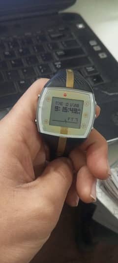 polar FT7  black and gold sports watch