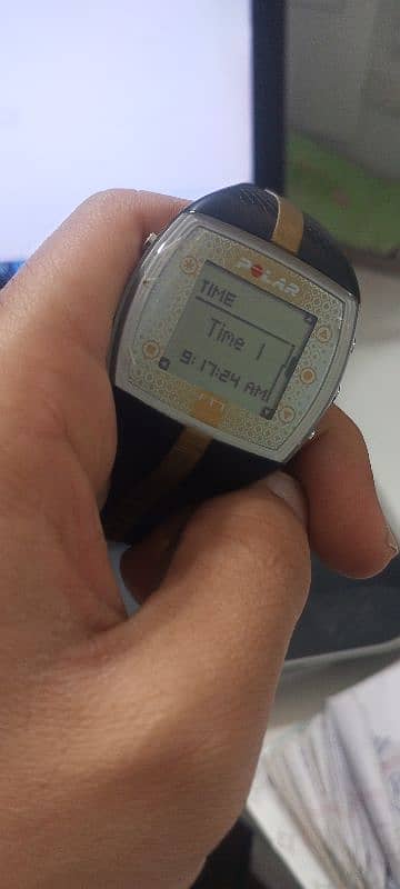 polar FT7  black and gold sports watch 2