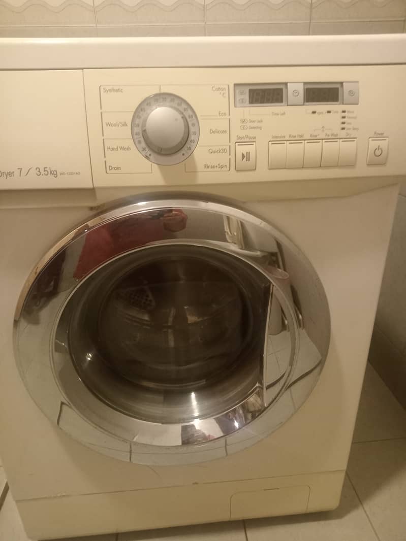 Lg front load with dryer fully automatic Washing machine in excellent 1