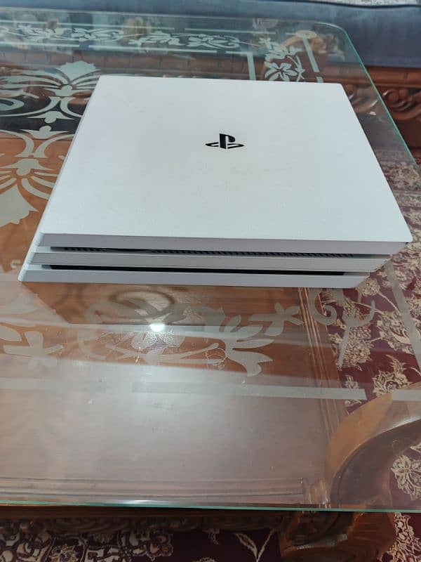 Ps4 Pro 1Tb 12 version Update with 8 games installed and with box. 5