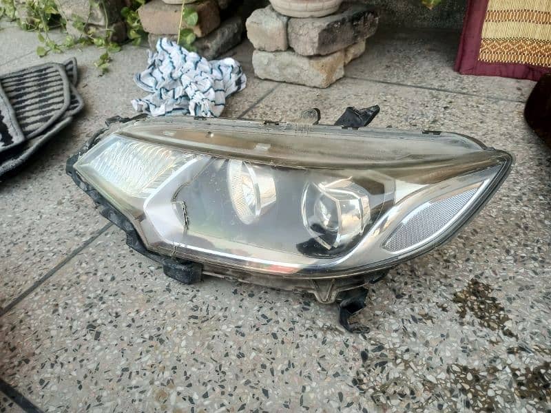 Honda fit gp5 bonnet+left light 0