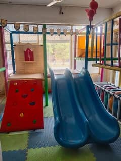 indoor playland /kids playland/kids slide/kids swings/play area/indoor