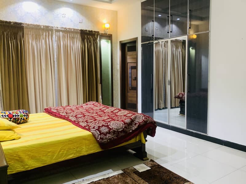 12 marla house for sale in johar town block F  Like Brnd new (original picture) 4 year used  Tile flooring  Double kitchen  Double unit Main apporced  Hot location 4