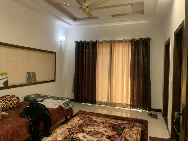 12 marla house for sale in johar town block F  Like Brnd new (original picture) 4 year used  Tile flooring  Double kitchen  Double unit Main apporced  Hot location 11