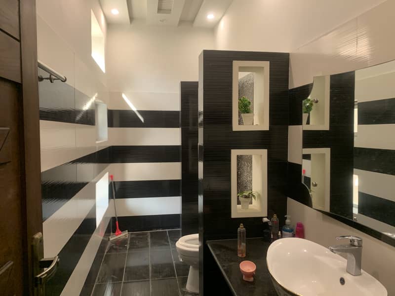 12 marla house for sale in johar town block F  Like Brnd new (original picture) 4 year used  Tile flooring  Double kitchen  Double unit Main apporced  Hot location 12