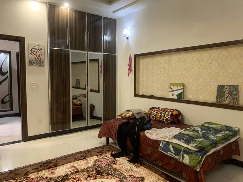 12 marla house for sale in johar town block F  Like Brnd new (original picture) 4 year used  Tile flooring  Double kitchen  Double unit Main apporced  Hot location 14