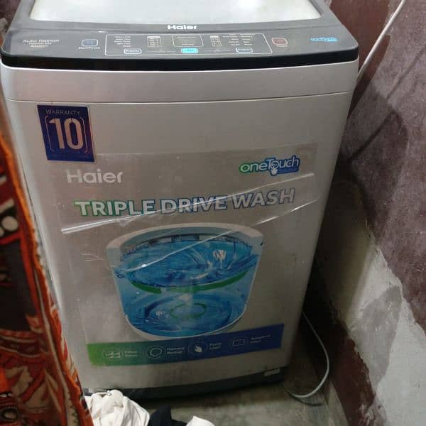 Haier Automatic washing and Dryer Machine 0