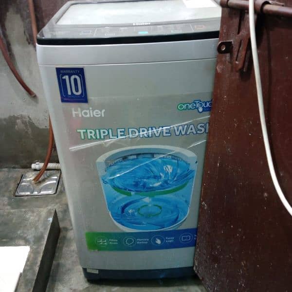 Haier Automatic washing and Dryer Machine 1