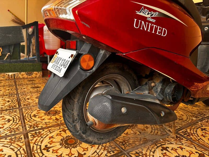 Scooty United 100 5