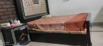 bed dressing, wooden dewaan and center table and iron dewan