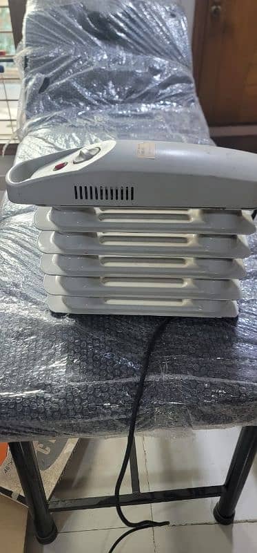 Tesco 7 Fins Electric Heater with Adjustable Thermostat 1