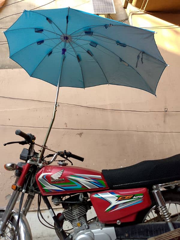 motorcycle umbrella delivery all over in pakistan 3