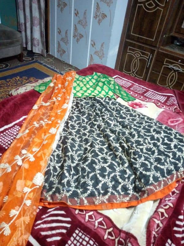 lehenga black with orange dupata and green shirt 3