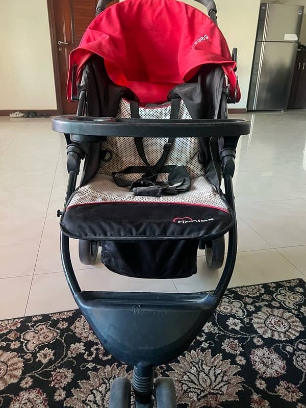 Tinnies pram slightly used contact number 0334-9272634 0