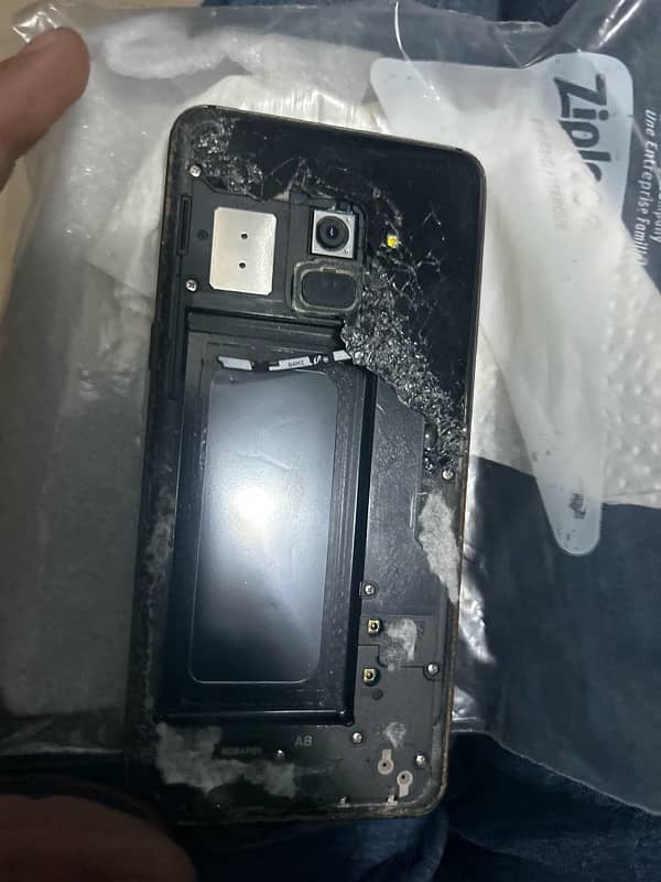 samsung a8 with broken back and corner crack on panel without battery 0