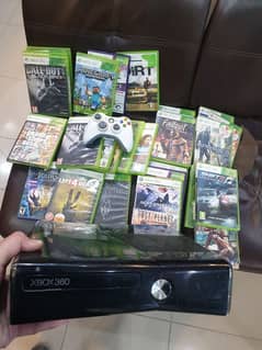 xbox 360 jet black with 30 games 1 wireless controller complete box.