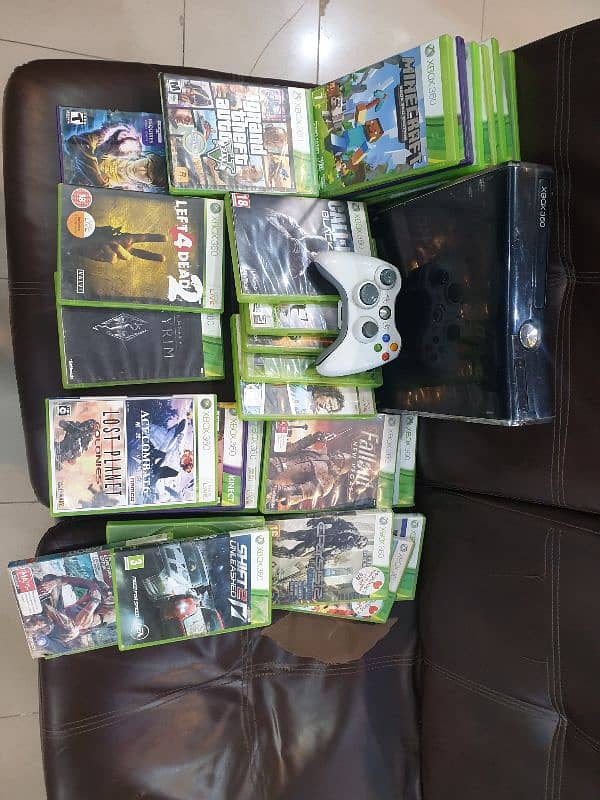 xbox 360 jet black with 30 games 1 wireless controller complete box. 2