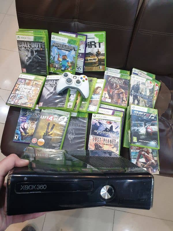 xbox 360 jet black with 30 games 1 wireless controller complete box. 3