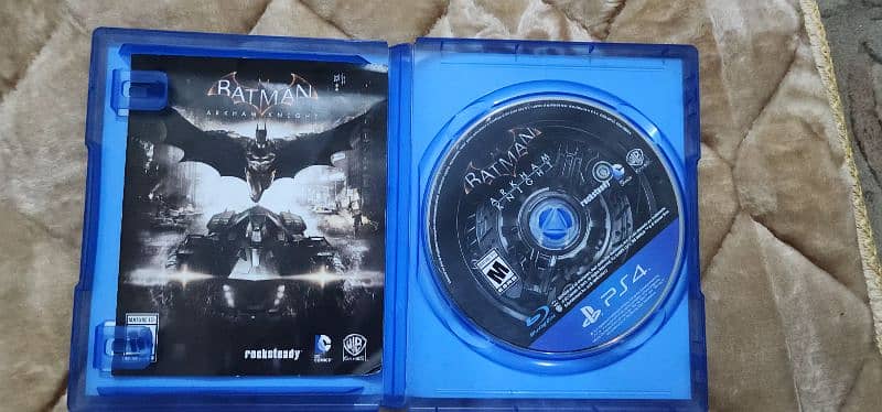 god of war 3 PS4 and batman Arkham knitw 6