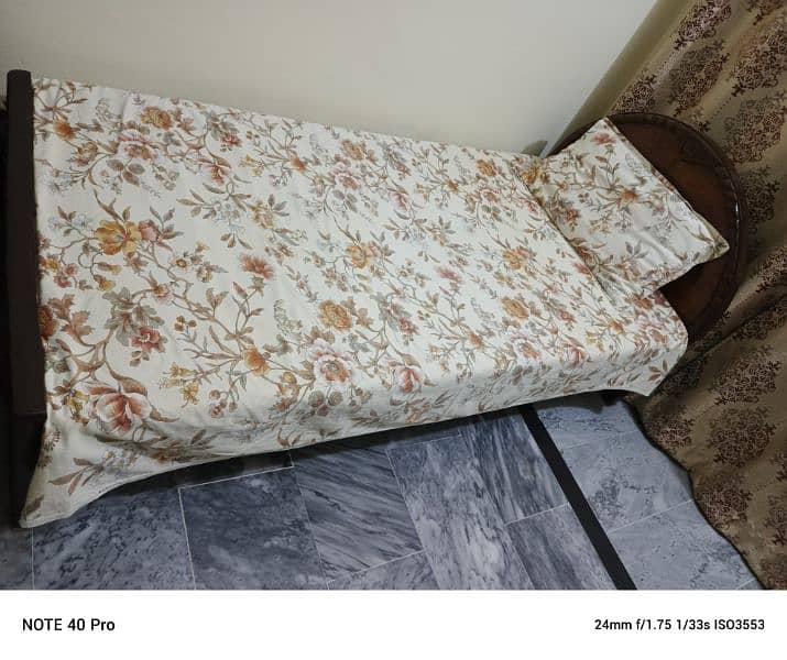 two single wooden bed with mattess 3