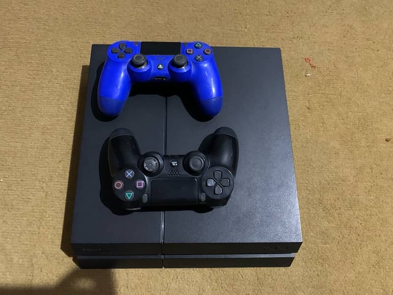 PS4 with 2 controllers 1