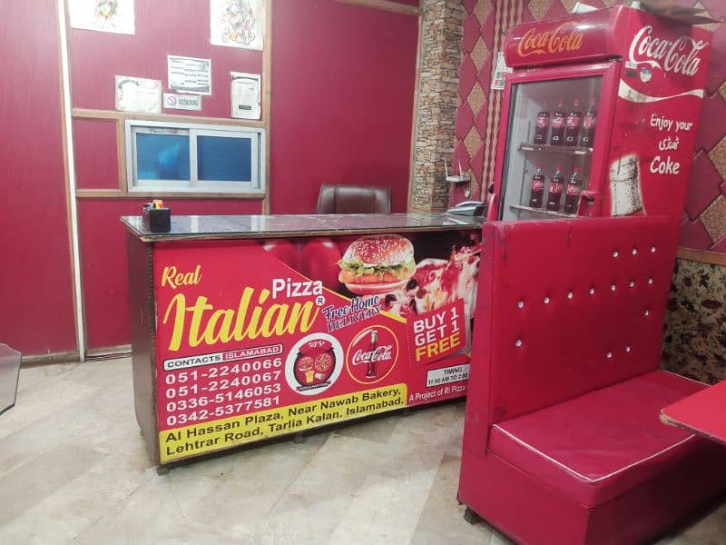 running pizza restaurant for sale at good location. islamabad . 3