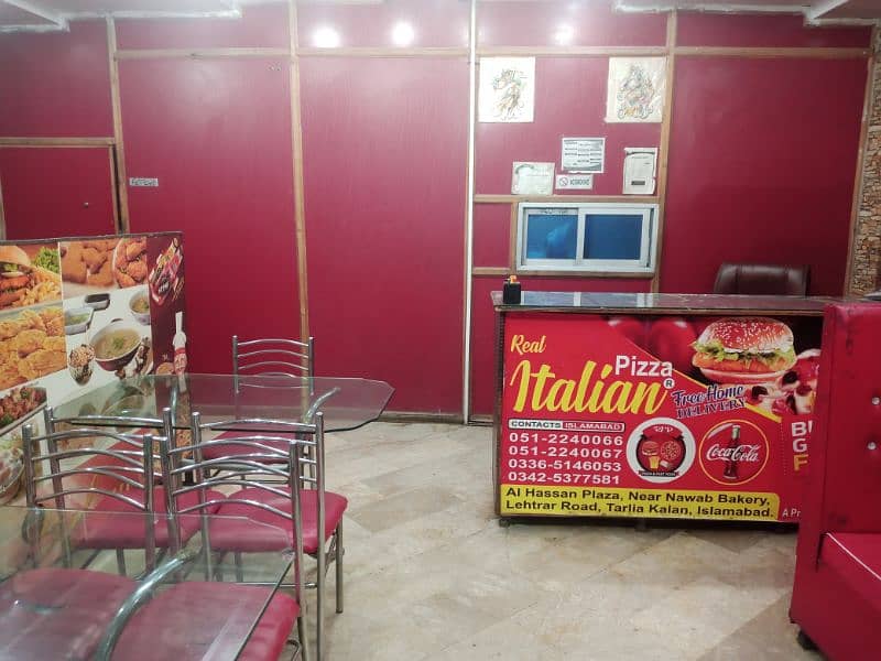 running pizza restaurant for sale at good location. islamabad . 5