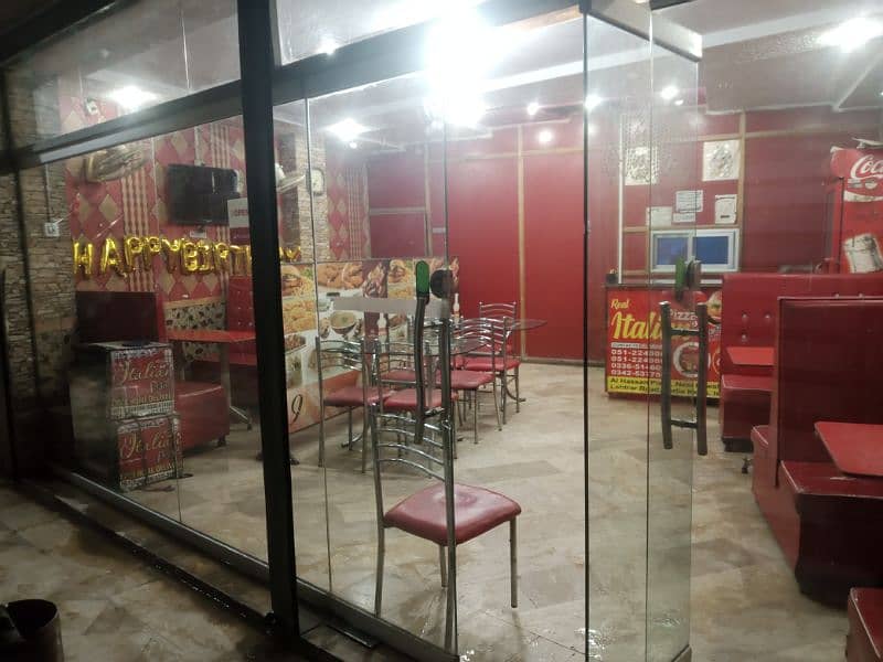 running pizza restaurant for sale at good location. islamabad . 6