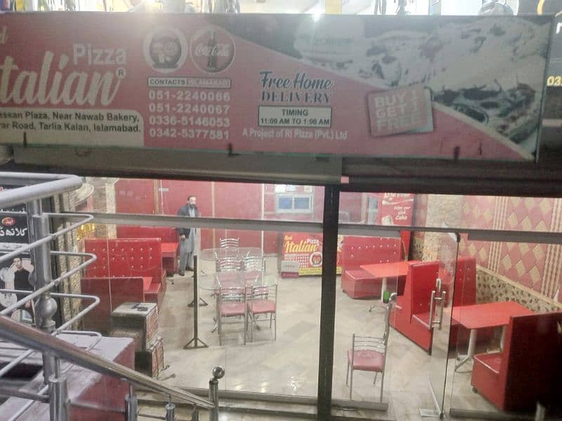 running pizza restaurant for sale at good location. islamabad . 12