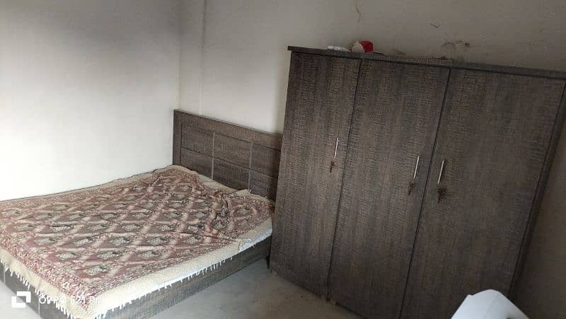 one cupboard 3 door's two beds New condition 1