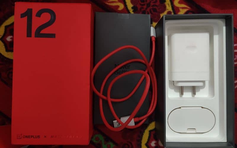 oneplus 12 16+4/512  100% okay set box 100watt charger 25 mint full ch 1