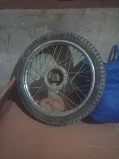 Suzuki 110 front wheel