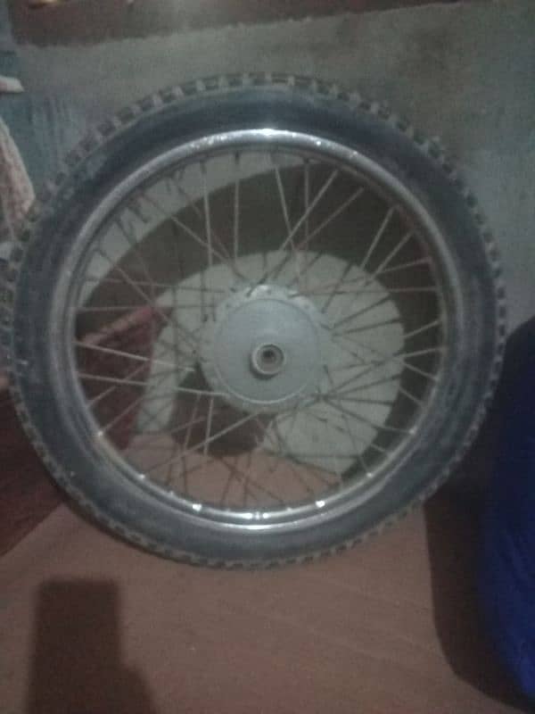 Suzuki 110 front wheel 1