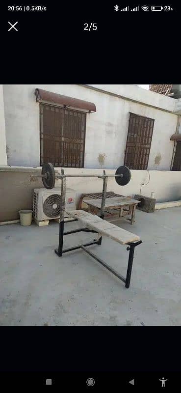 Chest Bench Press with Rod and Weights 3