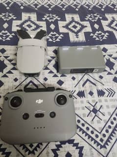 Dji mini 2 (for parts) , 3 batteries , rcn1 controller, accessories