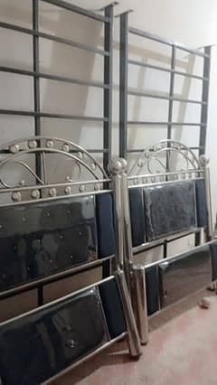 single steel bed pair