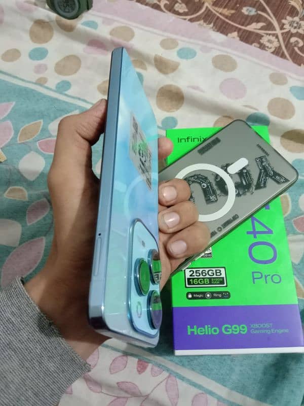 infinix hot 40 pro (blue shine new color) 8 month warranty 8+8  256 3