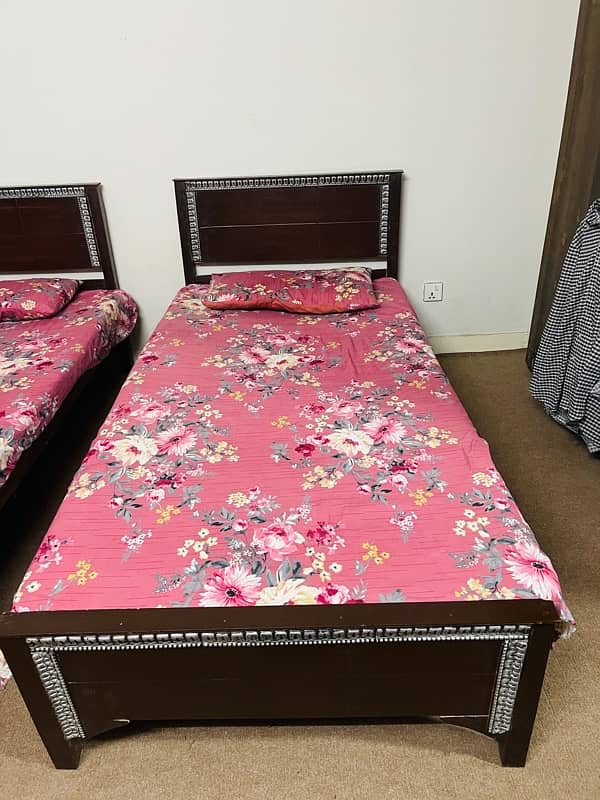 2 single bed without matress 1