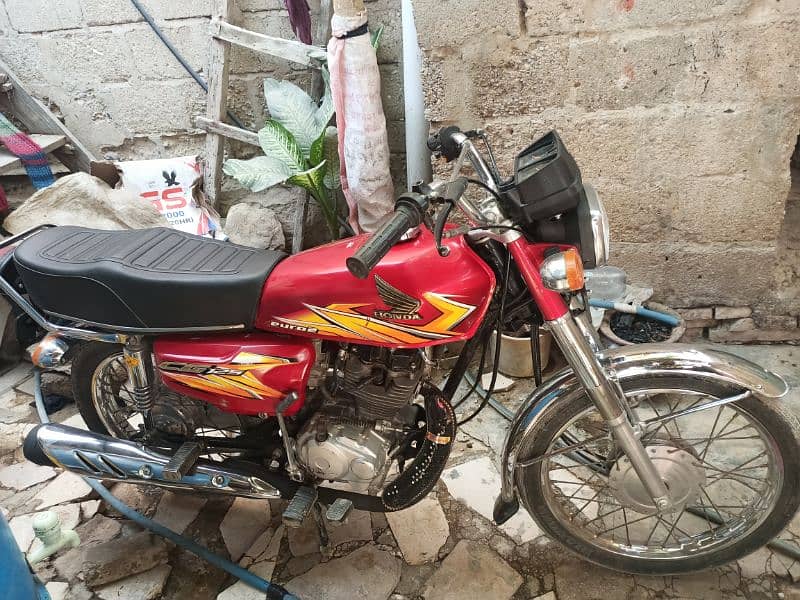 Honda 125 2021 Karachi number ha first owner 8