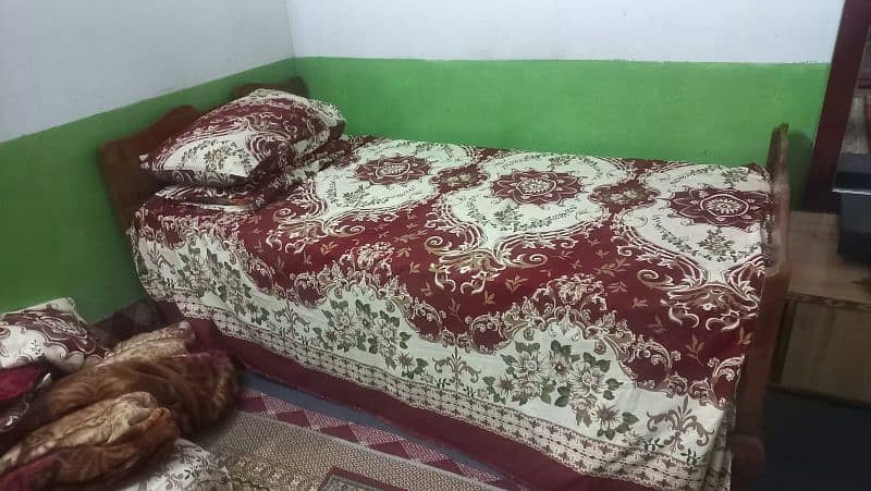 wooden single bed with Brand New mattress 0