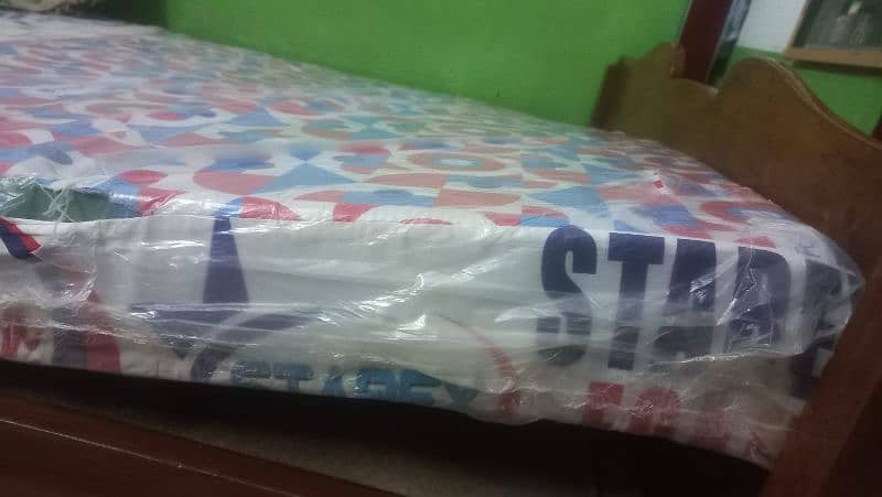 wooden single bed with Brand New mattress 5