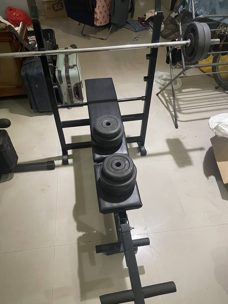 Bench press with rubber coated plates & 5 ft rod 2