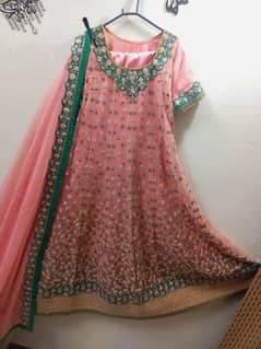 Party wear silky Net frawk with embroided dupatta and trawzer. . .