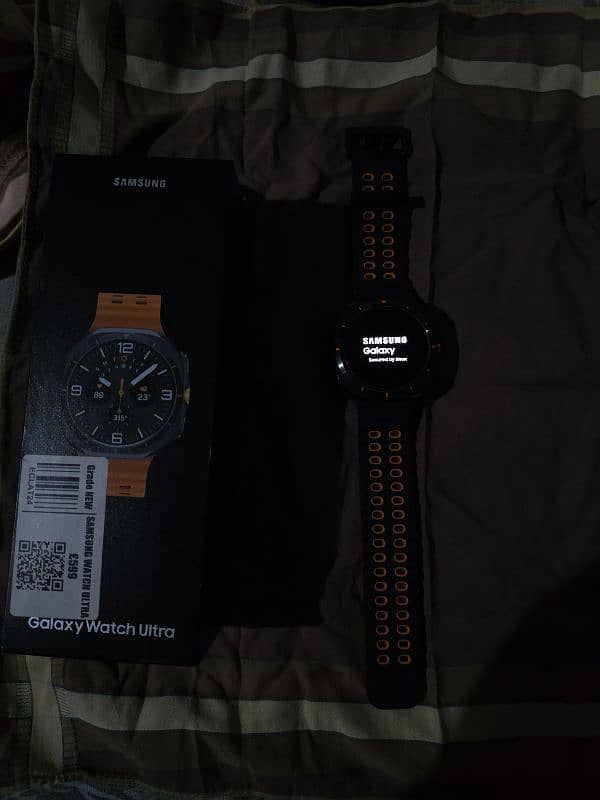 galaxy watch ultra titanium Grey with box and charger 10 days used 2