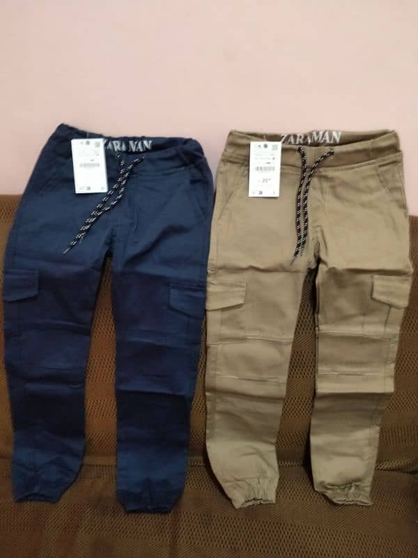 kids cargo trousers. 0